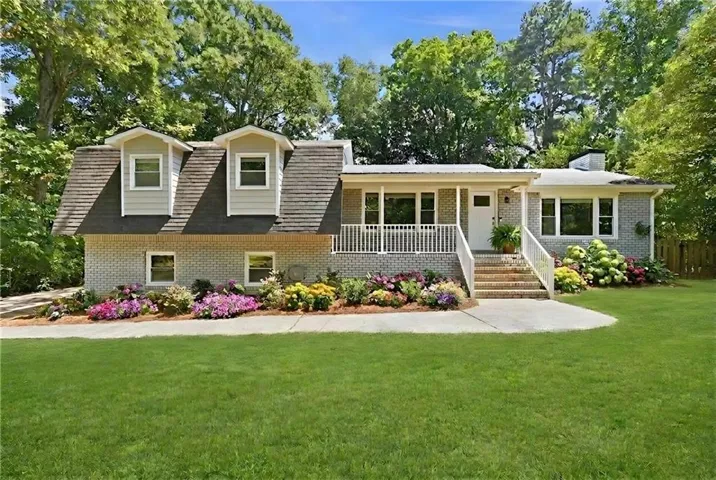 Front of home from street, landscaping is virtual
