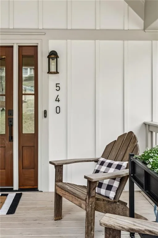 Doorway to property featuring a deck