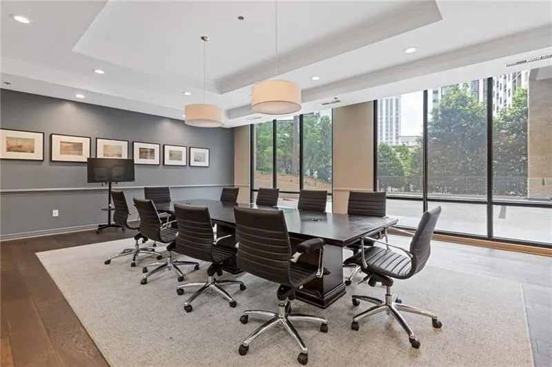 Home office featuring plenty of natural light, recessed lighting, and crown molding