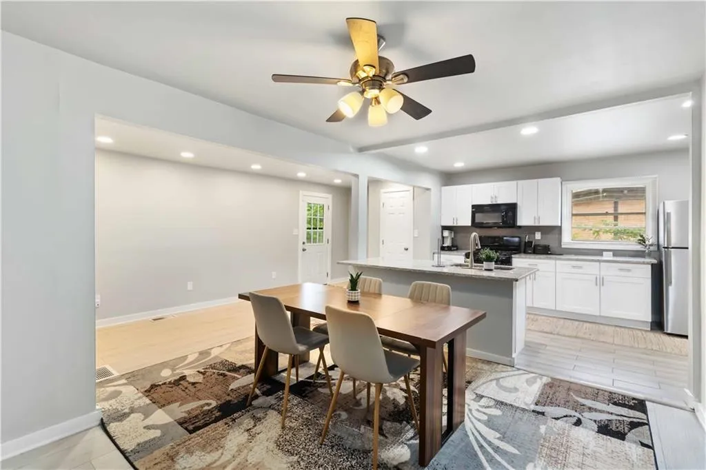 Dining space featuring recessed lighting, a ceiling fan, and light wood-type flooring