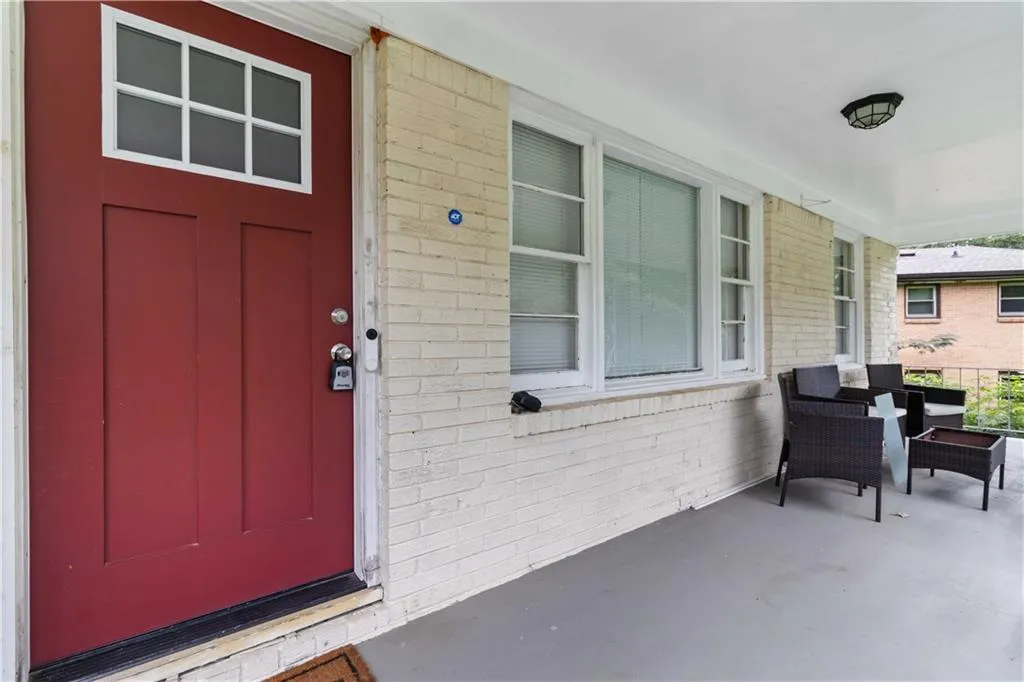 Property entrance with brick siding