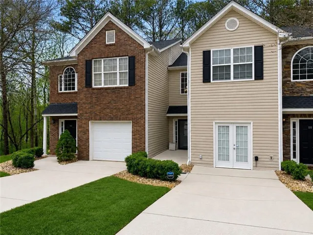 Brick and siding exterior with gabled roof lines