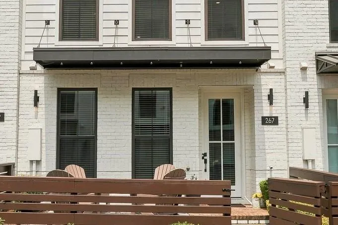 The gated front entrance is a lovely feature which beckons you into this beautiful townhome.