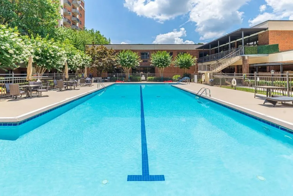 View of swimming pool with a patio area
