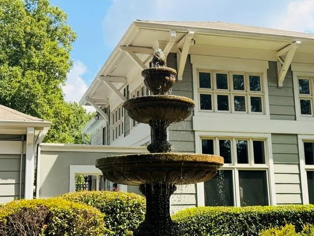 Beautiful community entry with flowing fountain