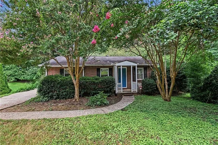 Charming Brick Ranch in an Incredible Tucker Location! Framed by Beautiful Pink Crepe Myrtles!