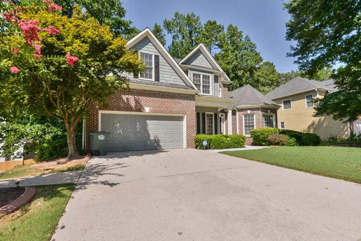 Brick and siding exterior with gabled roof lines
