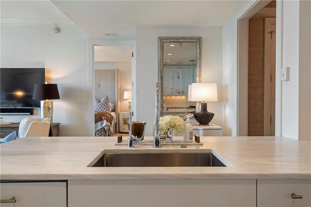 Expansive countertop with an undermount sink and polished fixtures