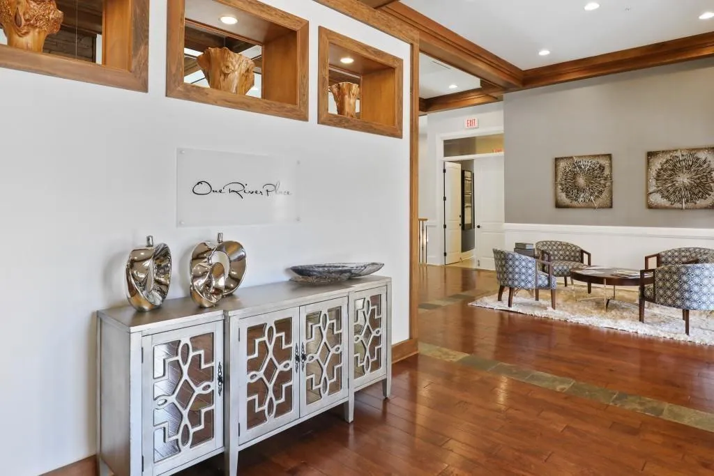 Large community clubhouse that has a gym, massage chairs, spa, coffee bar area, grilling area, and two salt water pools.