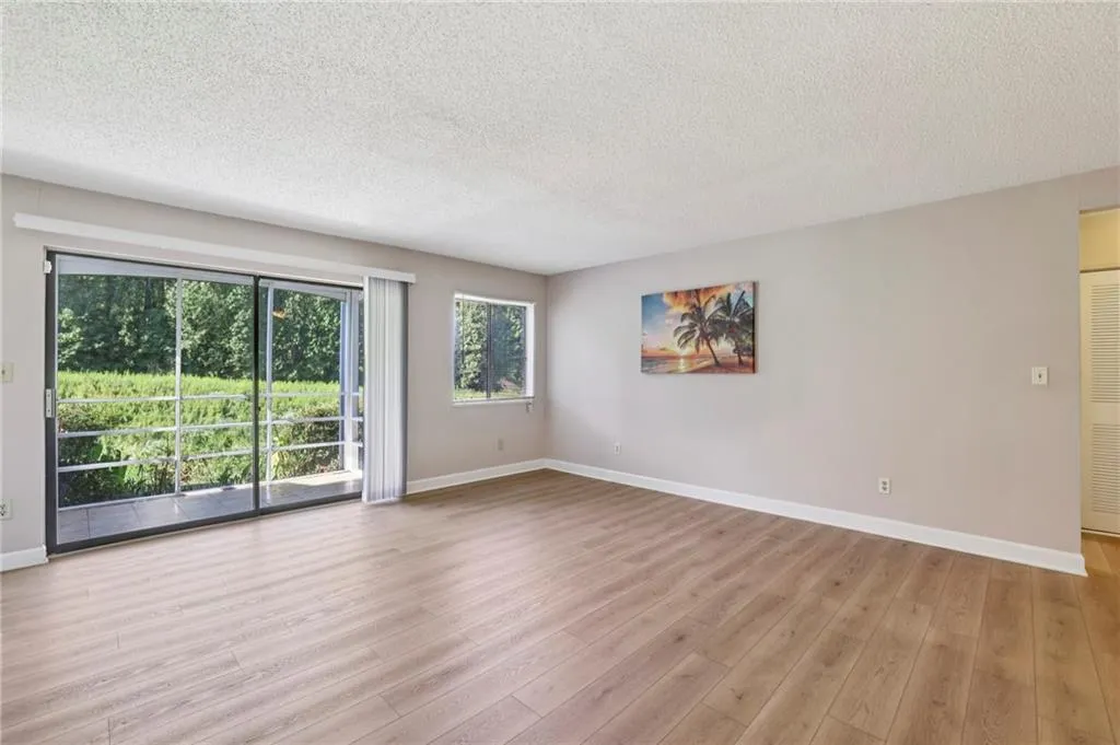 Living room with view to woods