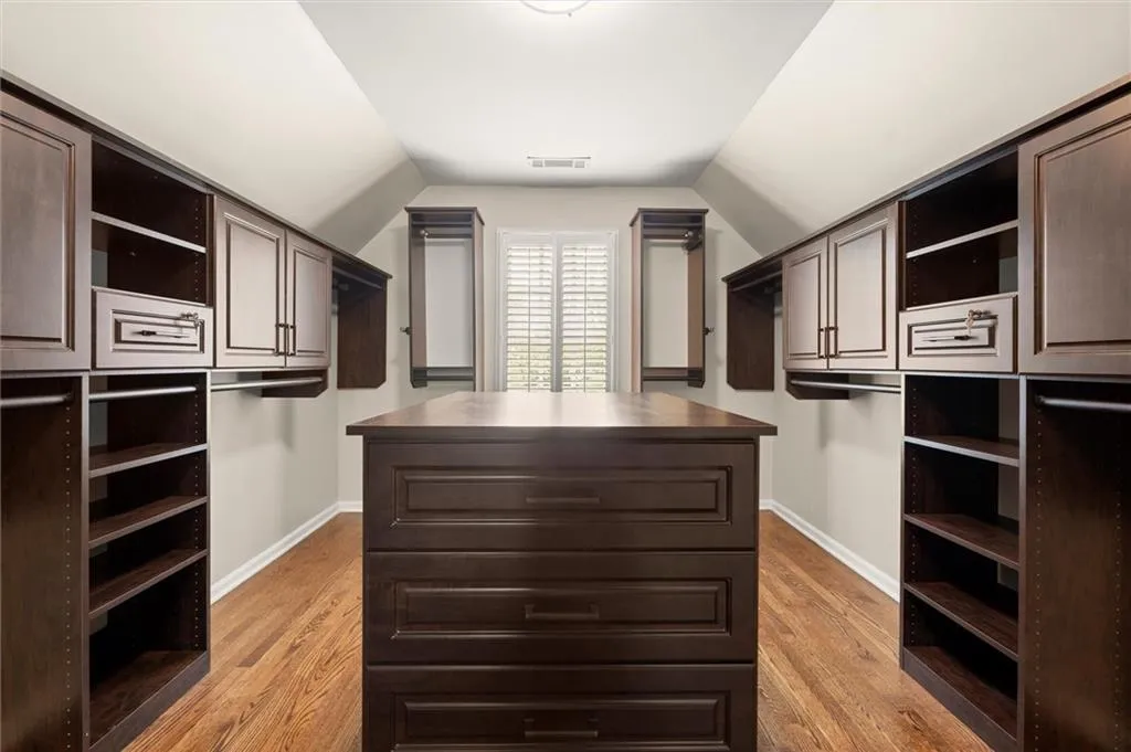 Walk in closet featuring light wood-type flooring
