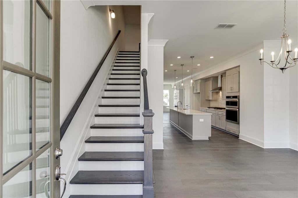Enter this home on the main level with beautiful foyer entry into Dining Room!