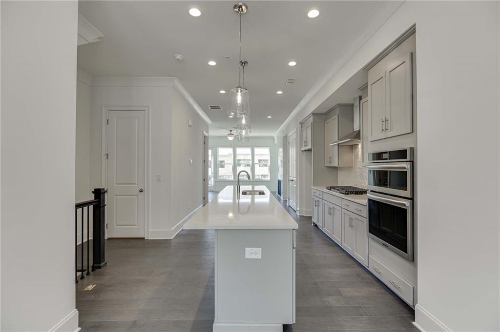 The central kitchen on the main level is an entertainers dream kitchen!