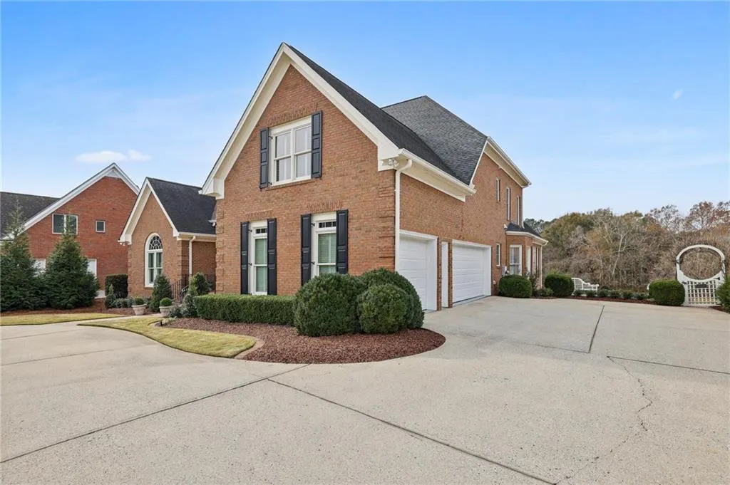 3 car garage and circular driveway
