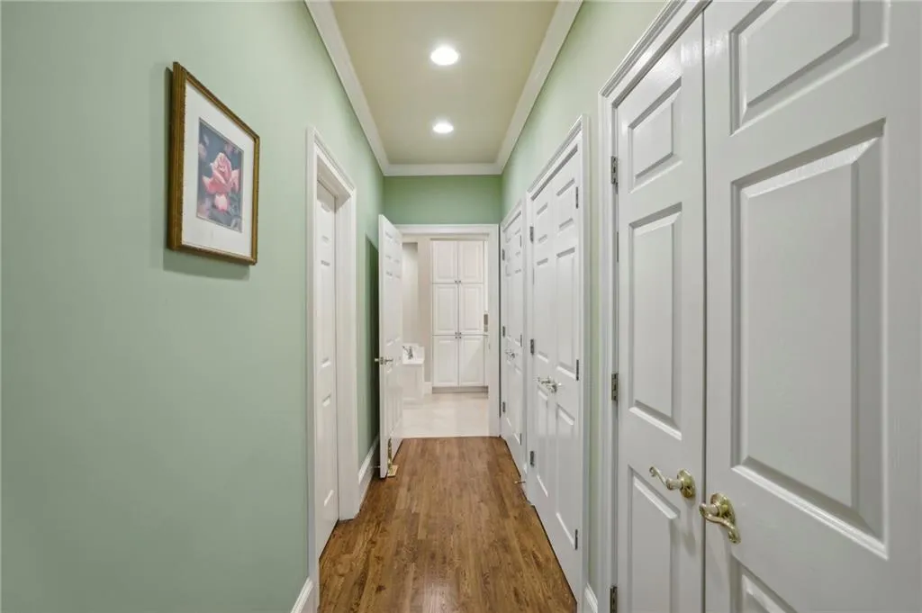 Primary bedroom hallway with extra closets