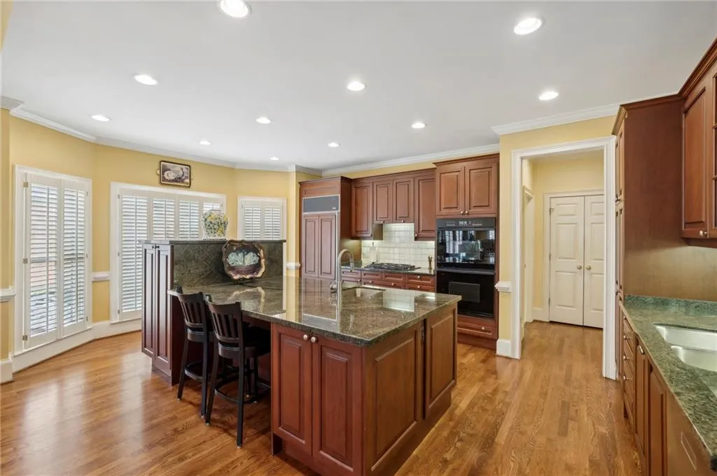 Large center island with custom cabinetry