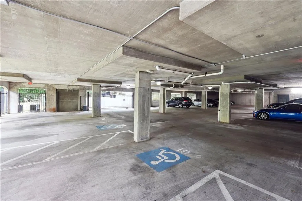 Garage featuring central air condition unit