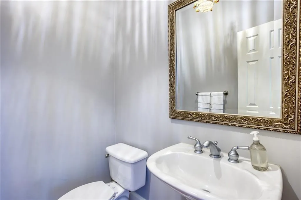 Bathroom with sink and toilet