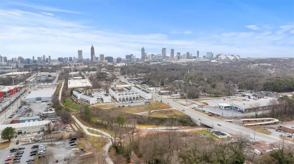 Drone / aerial view of skyline and a main thoroughfare