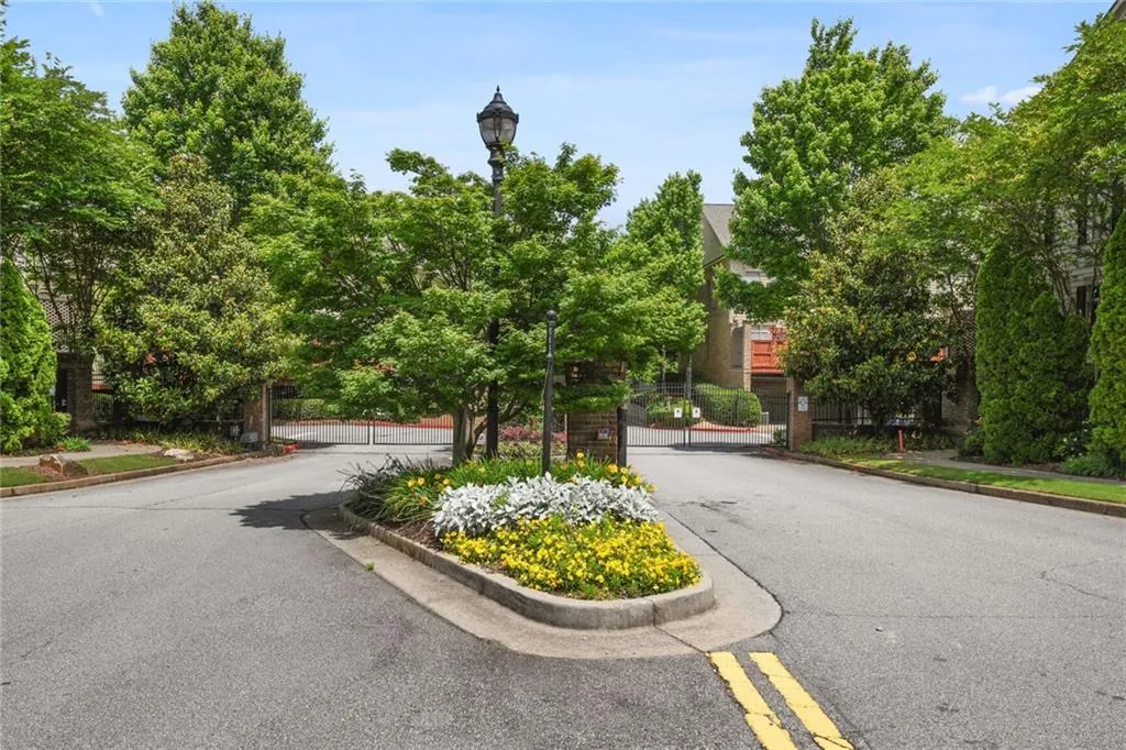 View of gated entrance to neighborhood.