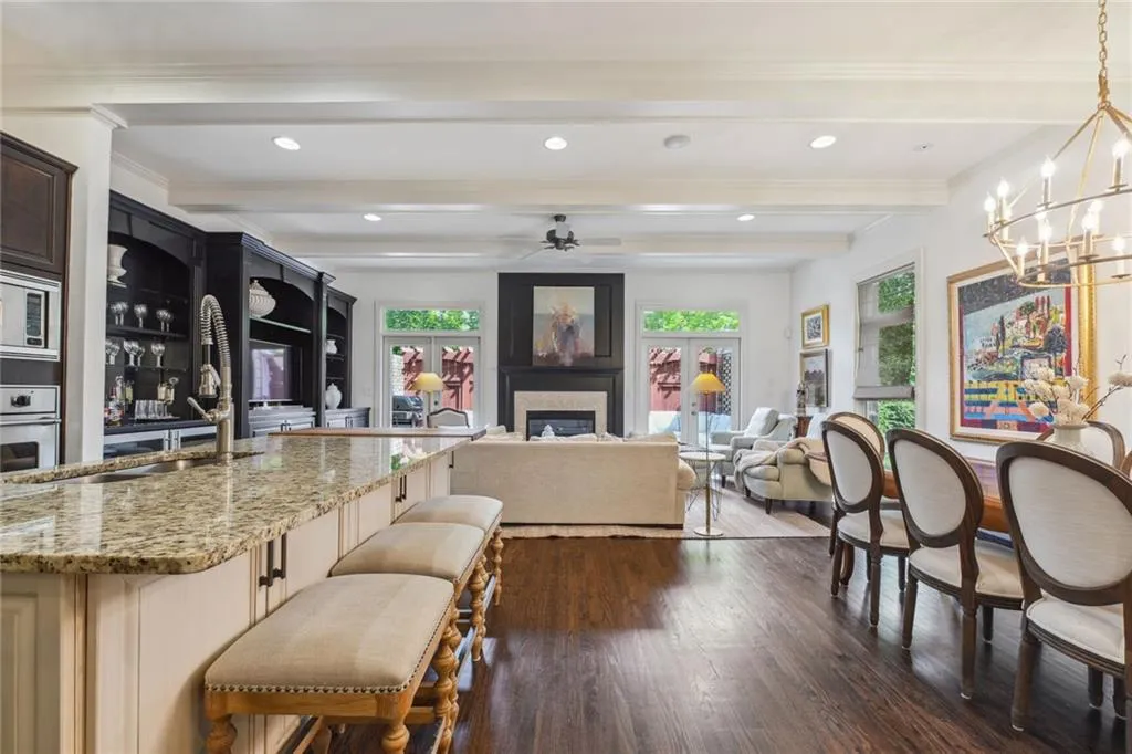 View of family room, kitchen, and casual dining room.