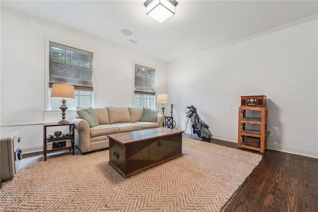 Terrace level has spacious bedroom/office or additional living space. tons  of sunlight, hardwood flooring and lots of closet space.