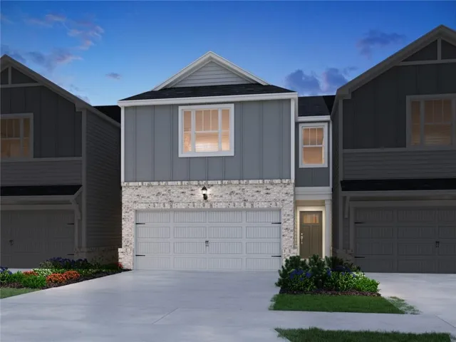 Modern exterior with brick facade and horizontal siding