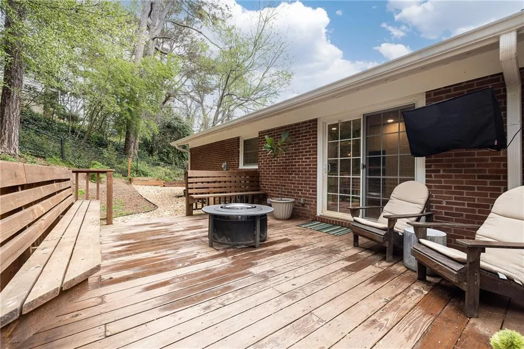 Deck featuring an outdoor fire pit