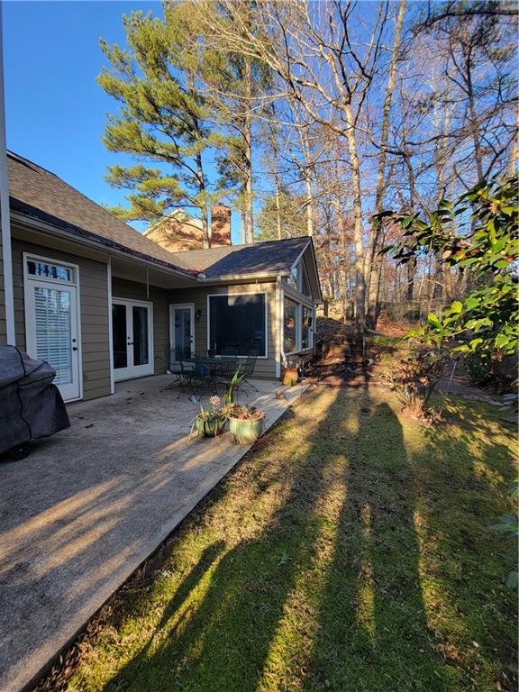 View of yard with a patio