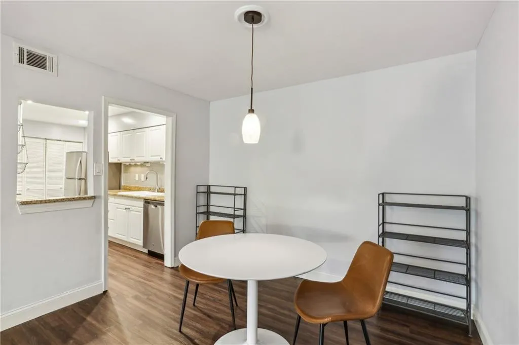 Dining adjoins kitchen for easy meal service.