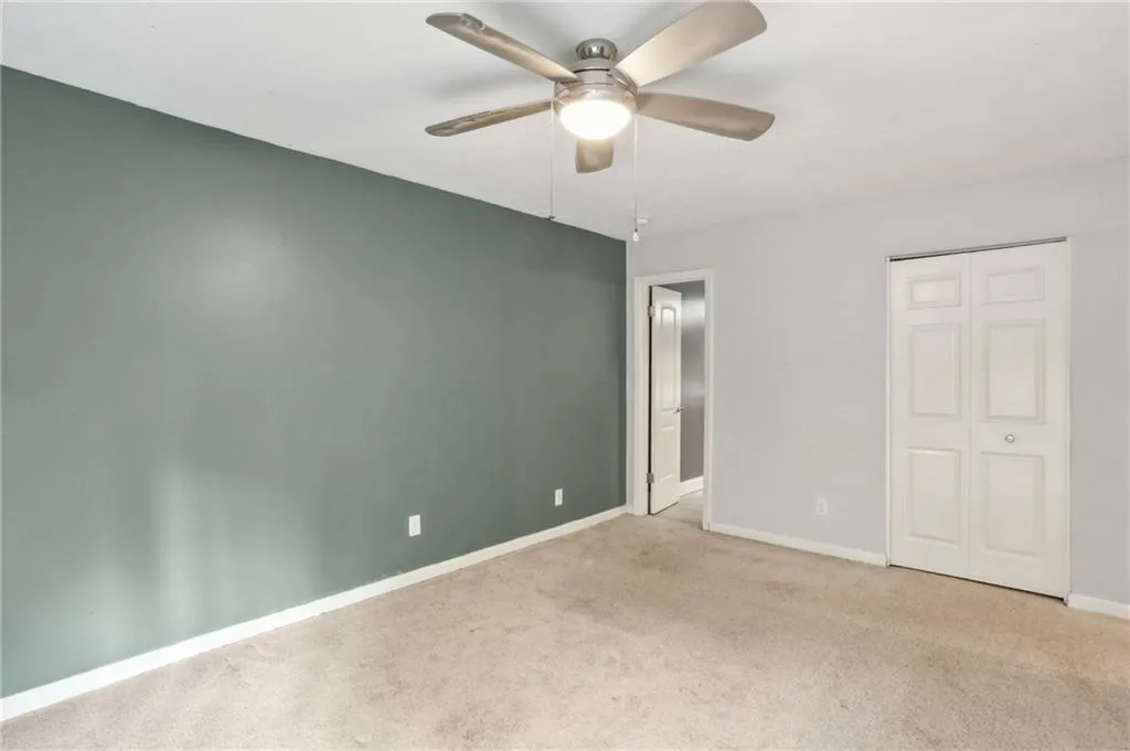 Main bedroom has two closets - a large walk-in closet, and a second closet near the private bathroom.