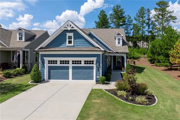Craftsman-style exterior with blue siding