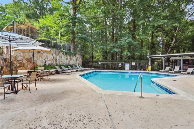 View of swimming pool featuring a patio