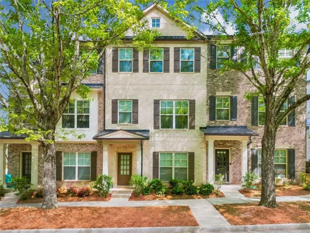Spacious Three-Story Traditional Townhome in an Amenities-Rich Community, just minutes from Downtown Suwanee!