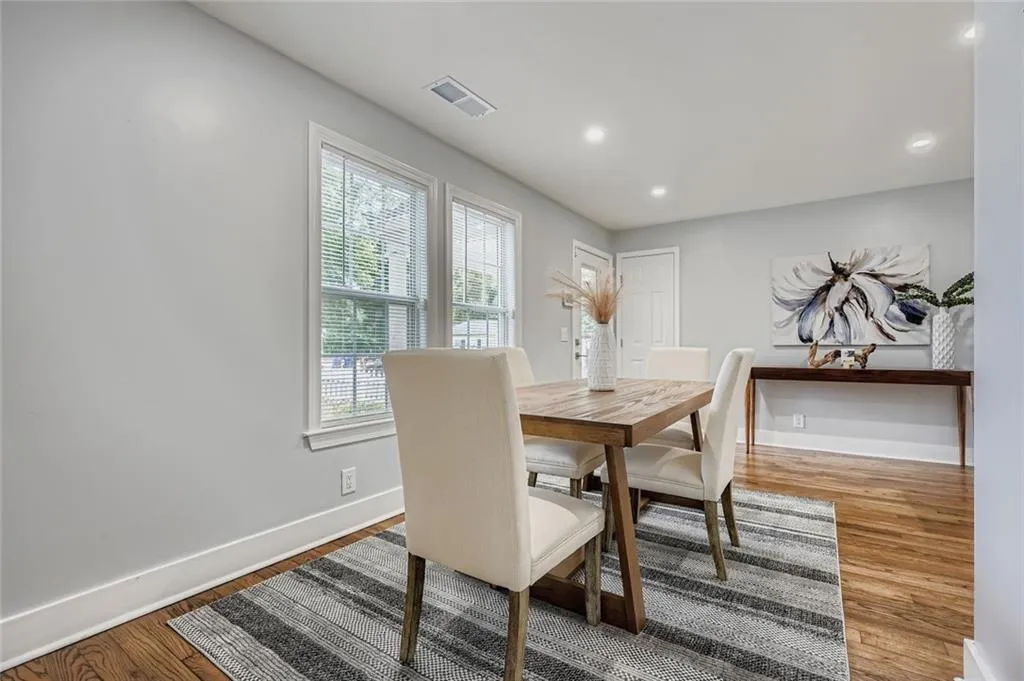 Another view of the great room (currently used for dining).  Note there is a coat closet.