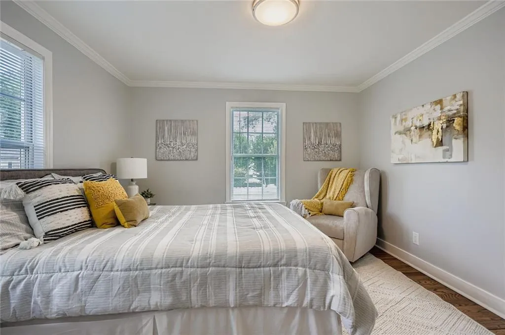 Another view of the primary bedroom