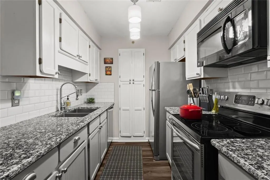 Galley Kitchen with granite countertops