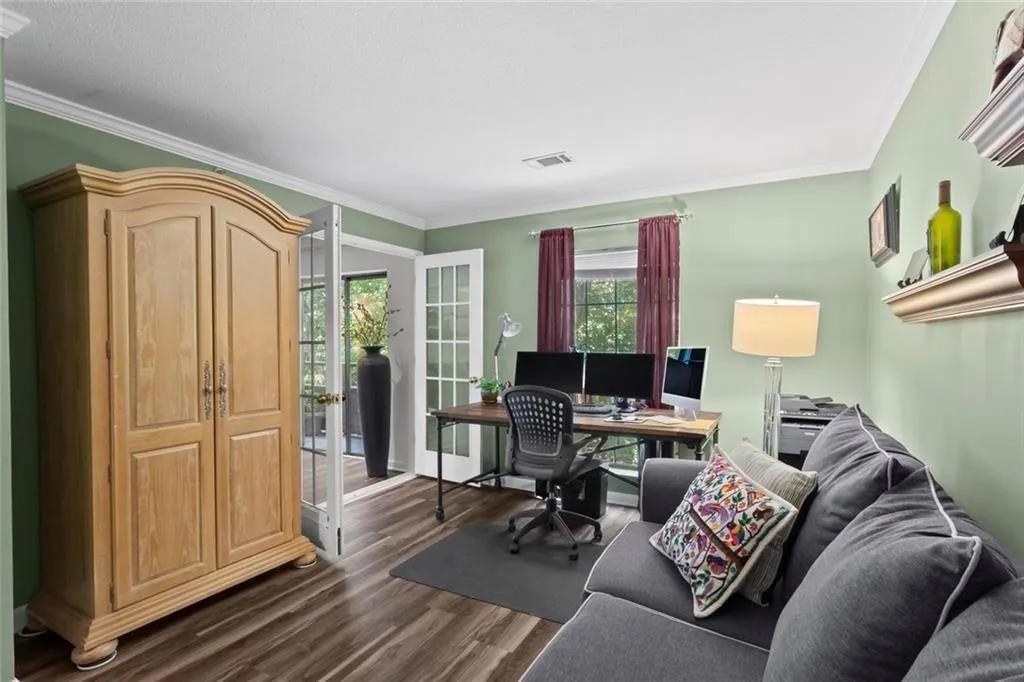 Second Bedroom also has a floor to ceiling window and double entrances.