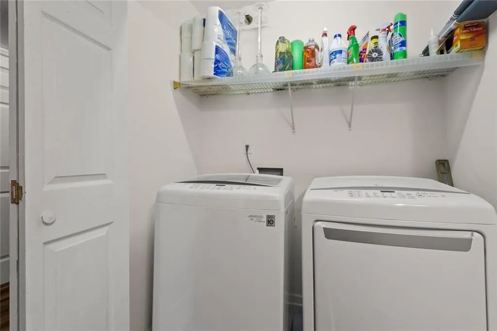 Laundry Closet in hallway between Second Bedroom and Bathroom