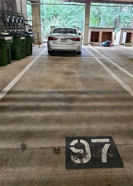 Two reserved, deeded parking spaces, 97 and 98 (where car is parked).  Just across from mailbox and elevator.