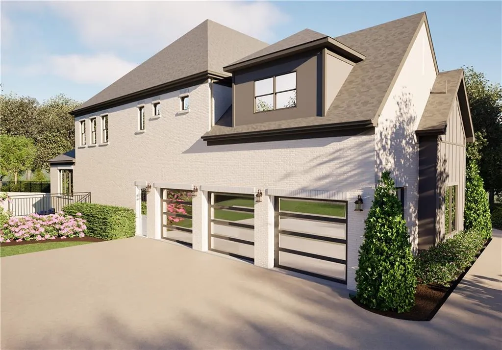 View of front facade featuring a garage