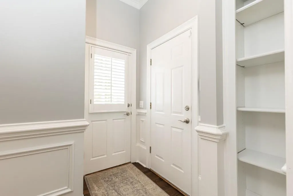 Side entry back door off keeping room and back door to large 3 car garage just steps from kitchen