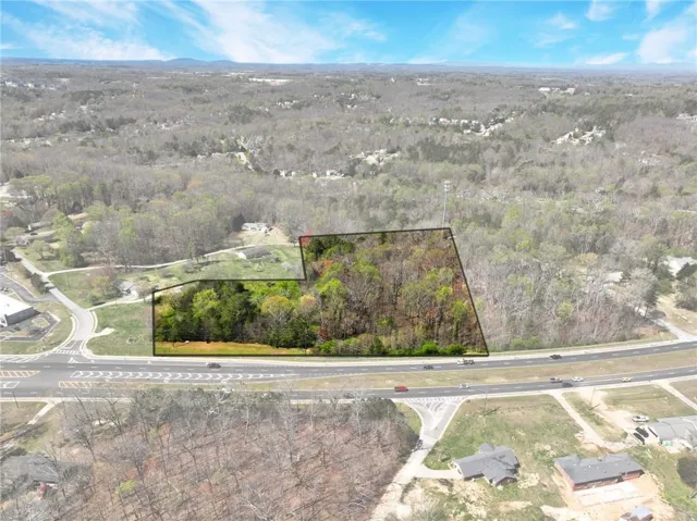 View of property location featuring a forest and property boundaries highlighted