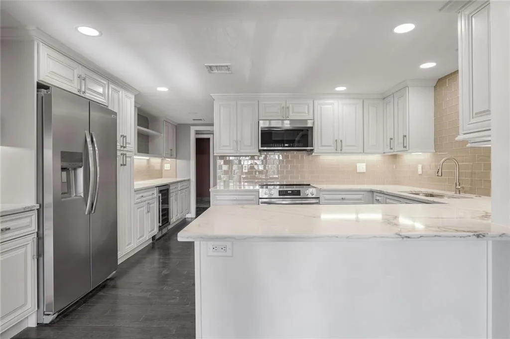 Completely Renovated Kitchen with Breakfast Bar.