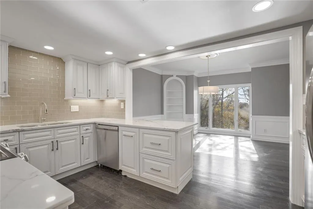 Completely Renovated Kitchen that opens up to the formal dining room.