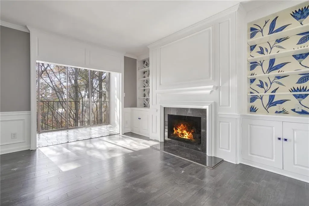 Den with Fireplace and Built-in Bookshelves
