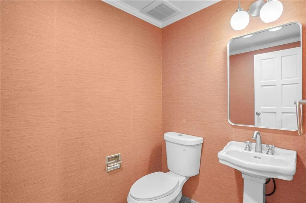 Powder Room - 1/2 Bath off the Main Central Hallway.
