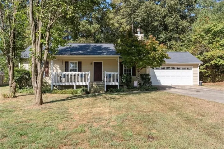 One level ranch home with kitchen level garage!