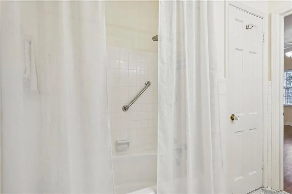 Bathroom featuring shower / bath combo