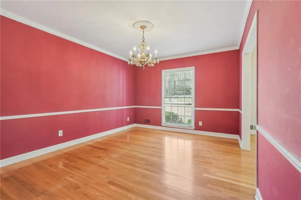 Dining Room with hardwood flooring. - current paint